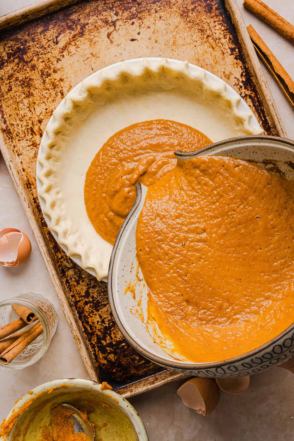 This creamy and delicious Healthy Pumpkin Pie makes the perfect holiday dessert! So easy to make, naturally sweetened with maple syrup and tastes great topped with whipped cream or vanilla ice cream!