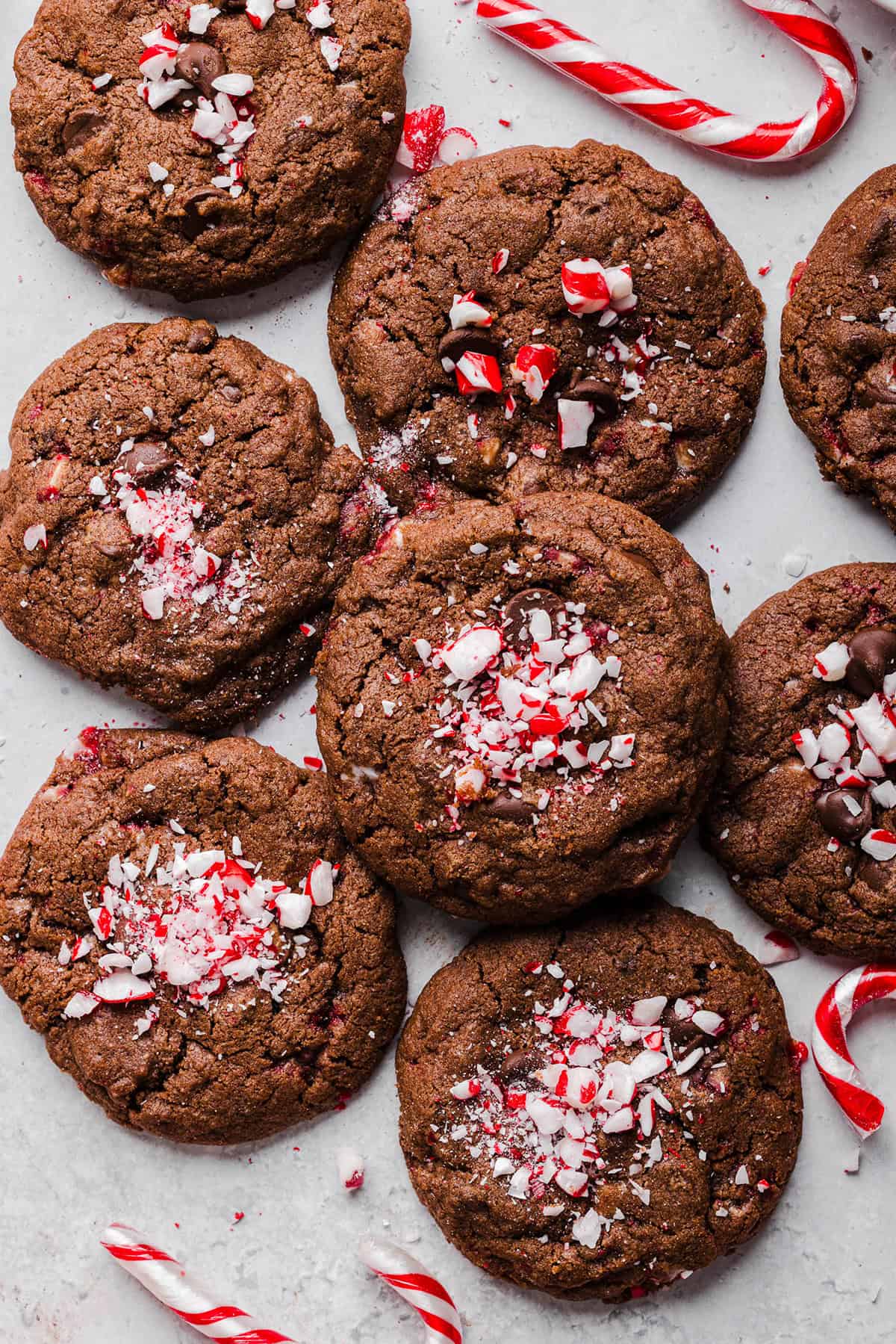These chewy Chocolate Peppermint Cookies are rich and fudgy with a festive candy cane crunch that are so easy to make! The perfect holiday cookie made healthier with less butter, whole wheat flour and zero refined sugar.