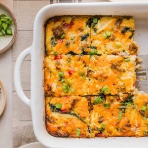 This Easy Hash Brown Breakfast Casserole is loaded with savory sausage, sautéed peppers and onions, along with melty cheese and perfectly seasoned eggs. The perfect recipe for your holiday brunch or weekend breakfast that can easily be prepped the night before!