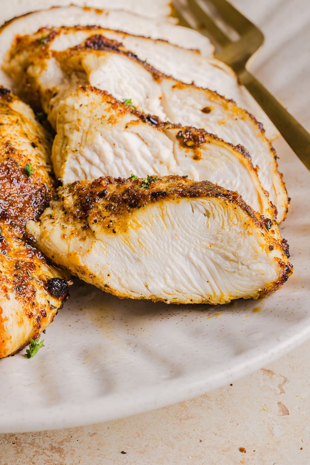 Juicy Air Fryer Chicken Breast recipe that comes out perfectly every time in just 20 minutes! Seasoned with a blend of herbs and spices for a delicious, healthy meal great for busy weeknights or when you need to meal prep.