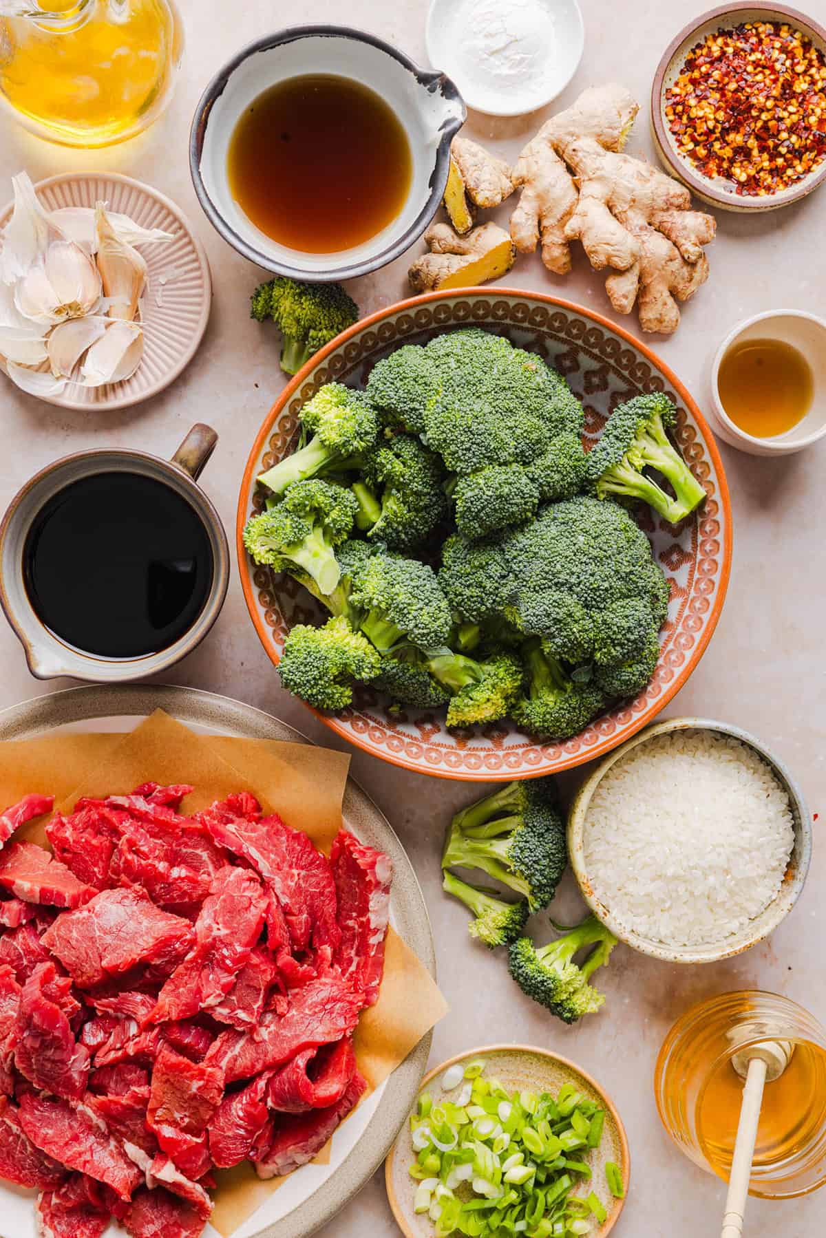 You'll love this Healthy Beef and Broccoli recipe made with tender flank steak, crisp broccoli and a savory garlic ginger sauce. A quick and easy weeknight dinner that tastes better than take-out and comes together in under 30 minutes!