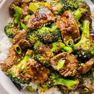 You'll love this Healthy Beef and Broccoli recipe made with tender flank steak, crisp broccoli and a savory garlic ginger sauce. A quick and easy weeknight dinner that tastes better than take-out and comes together in under 30 minutes!