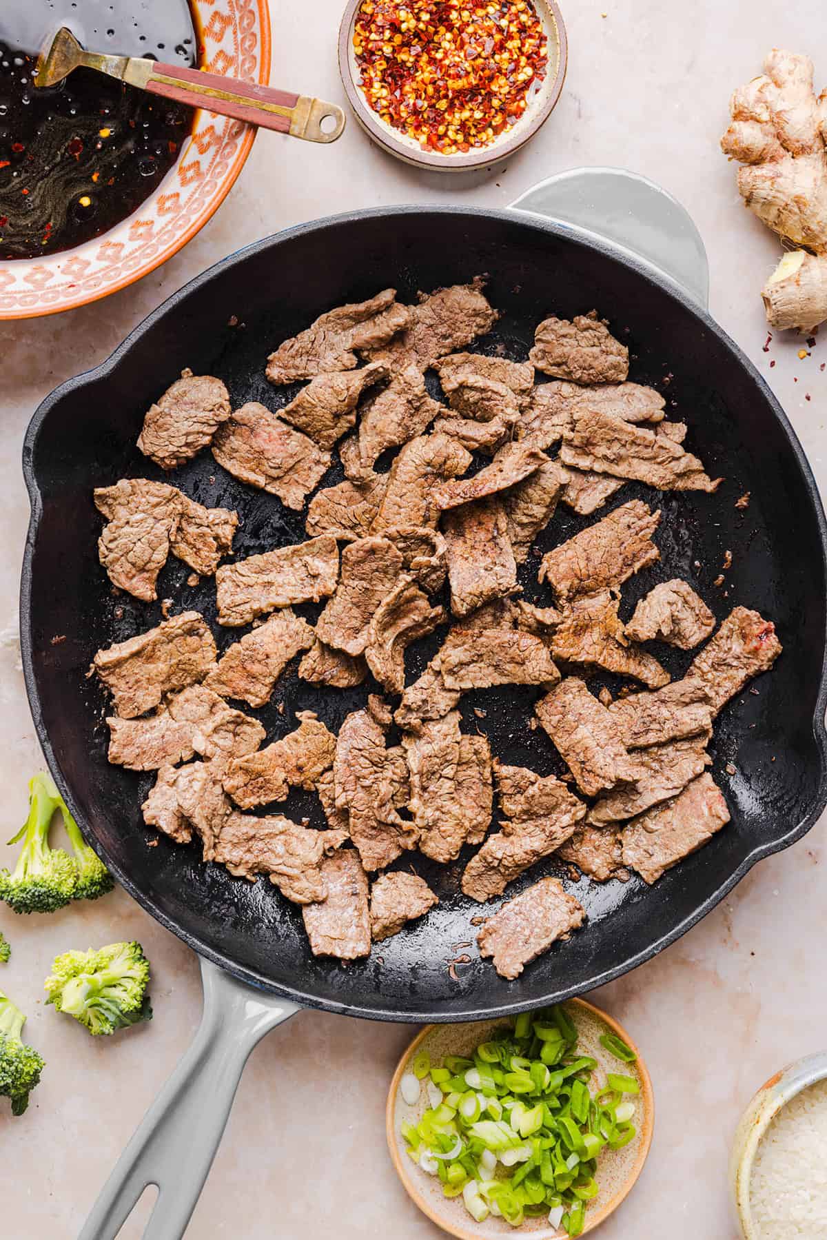 You'll love this Healthy Beef and Broccoli recipe made with tender flank steak, crisp broccoli and a savory garlic ginger sauce. A quick and easy weeknight dinner that tastes better than take-out and comes together in under 30 minutes!