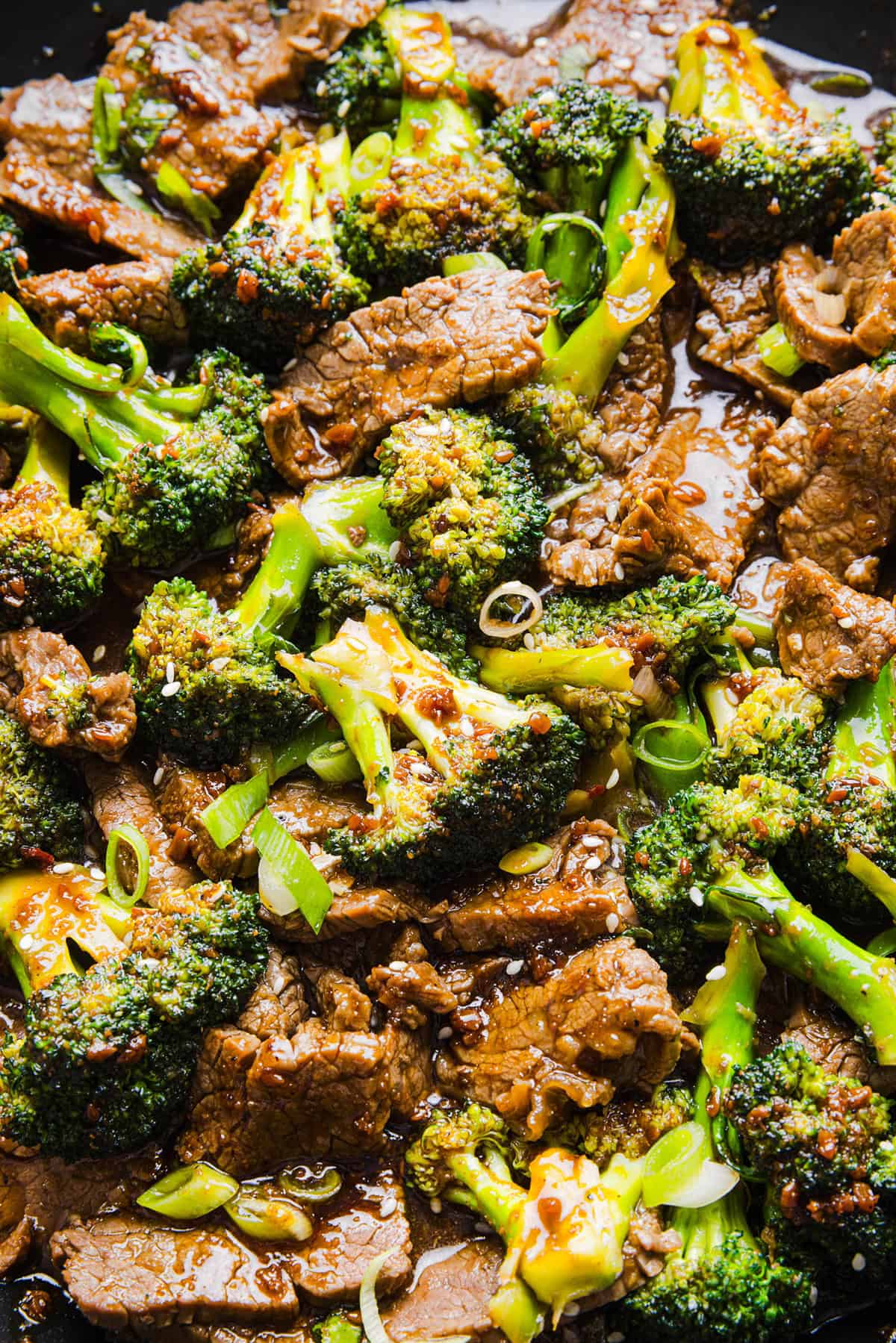 You'll love this Healthy Beef and Broccoli recipe made with tender flank steak, crisp broccoli and a savory garlic ginger sauce. A quick and easy weeknight dinner that tastes better than take-out and comes together in under 30 minutes!