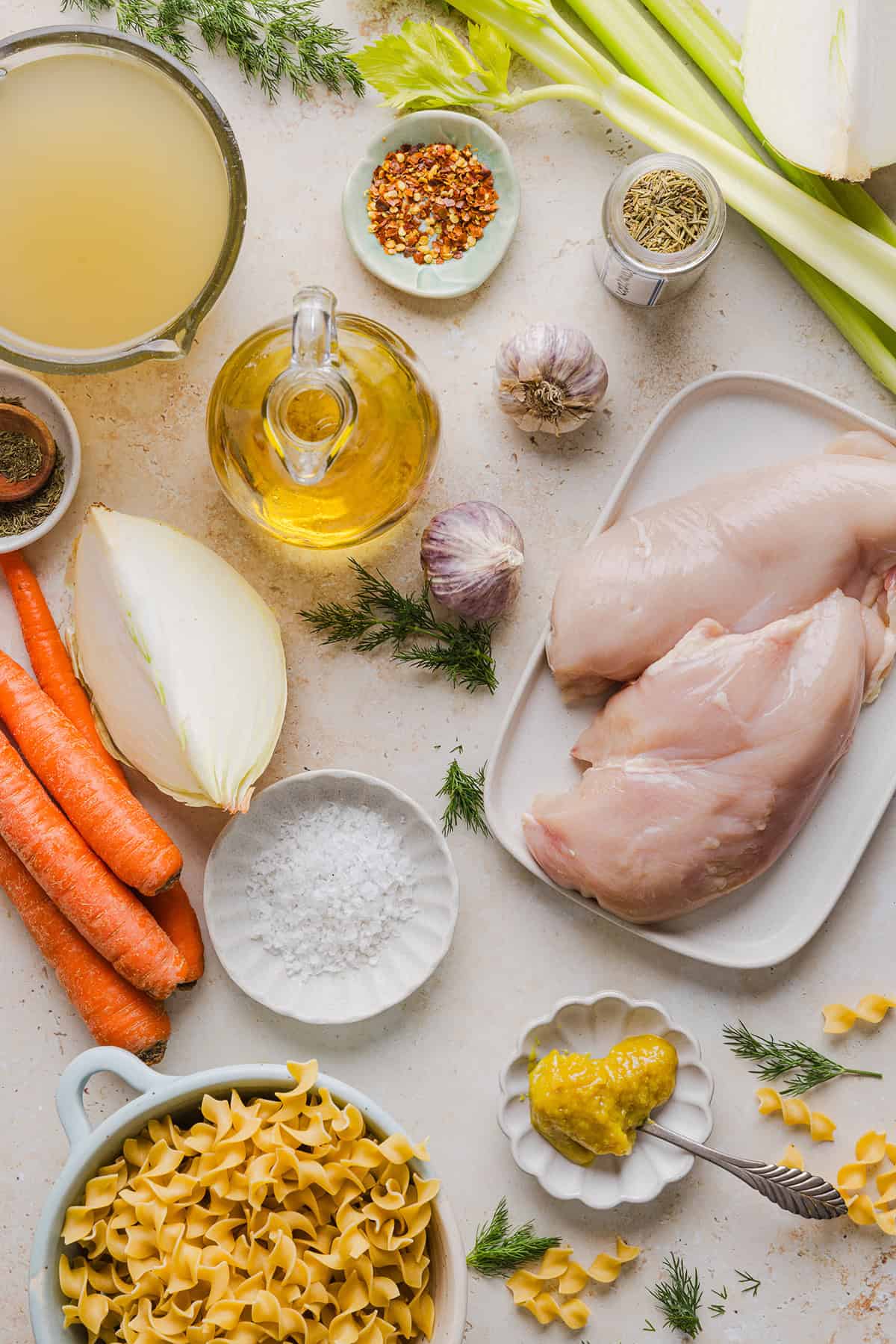 Enjoy a cozy bowl of this Easy Chicken Noodle Soup made with simple ingredients that pack in the flavor! Made with tender chicken, hearty vegetables and a rich, flavorful broth that is comforting and nourishing.