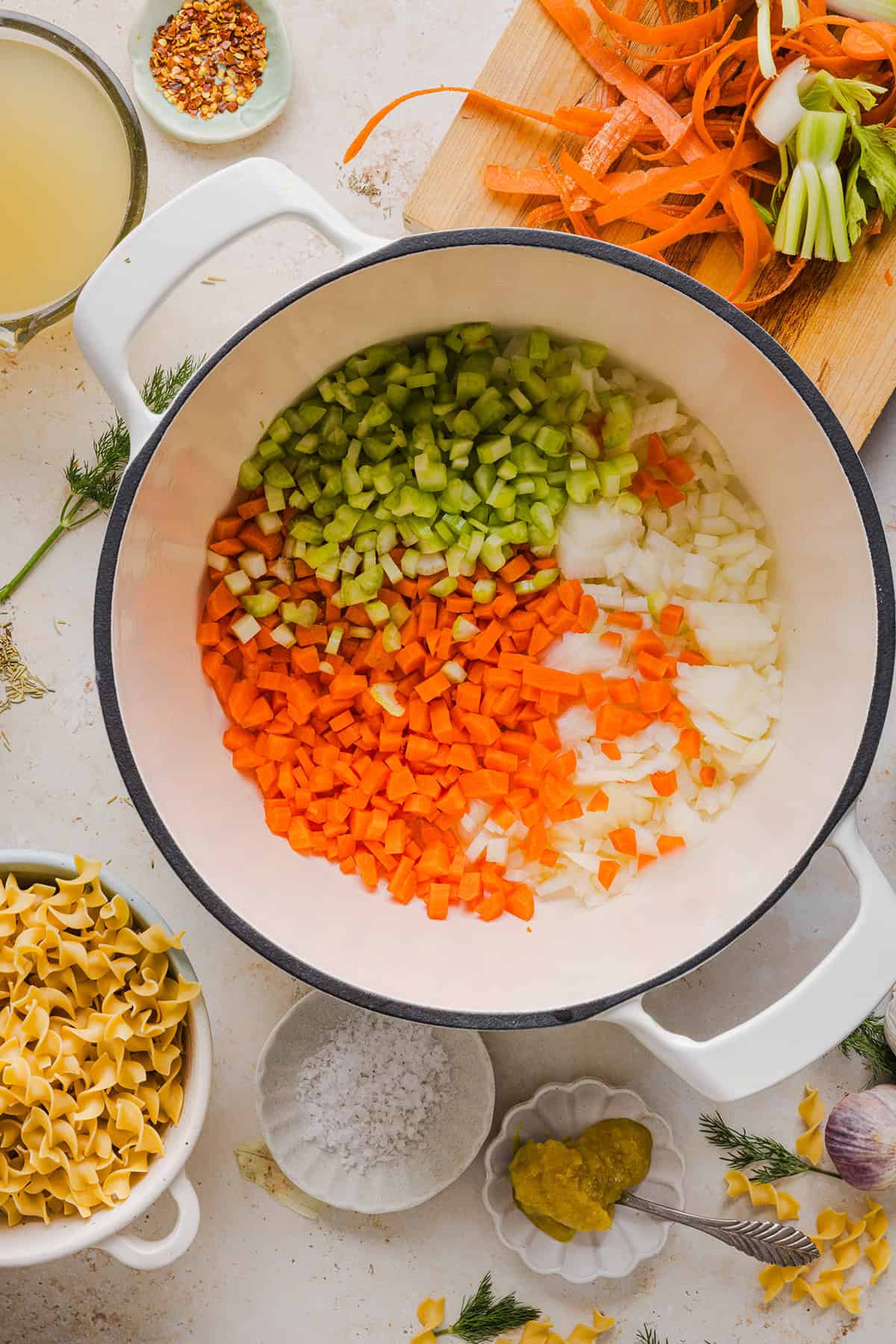 Enjoy a cozy bowl of this Easy Chicken Noodle Soup made with simple ingredients that pack in the flavor! Made with tender chicken, hearty vegetables and a rich, flavorful broth that is comforting and nourishing.