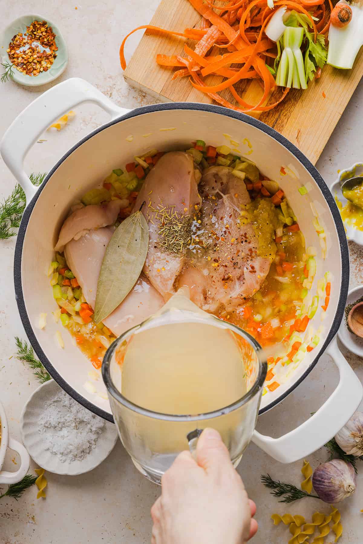Enjoy a cozy bowl of this Easy Chicken Noodle Soup made with simple ingredients that pack in the flavor! Made with tender chicken, hearty vegetables and a rich, flavorful broth that is comforting and nourishing.