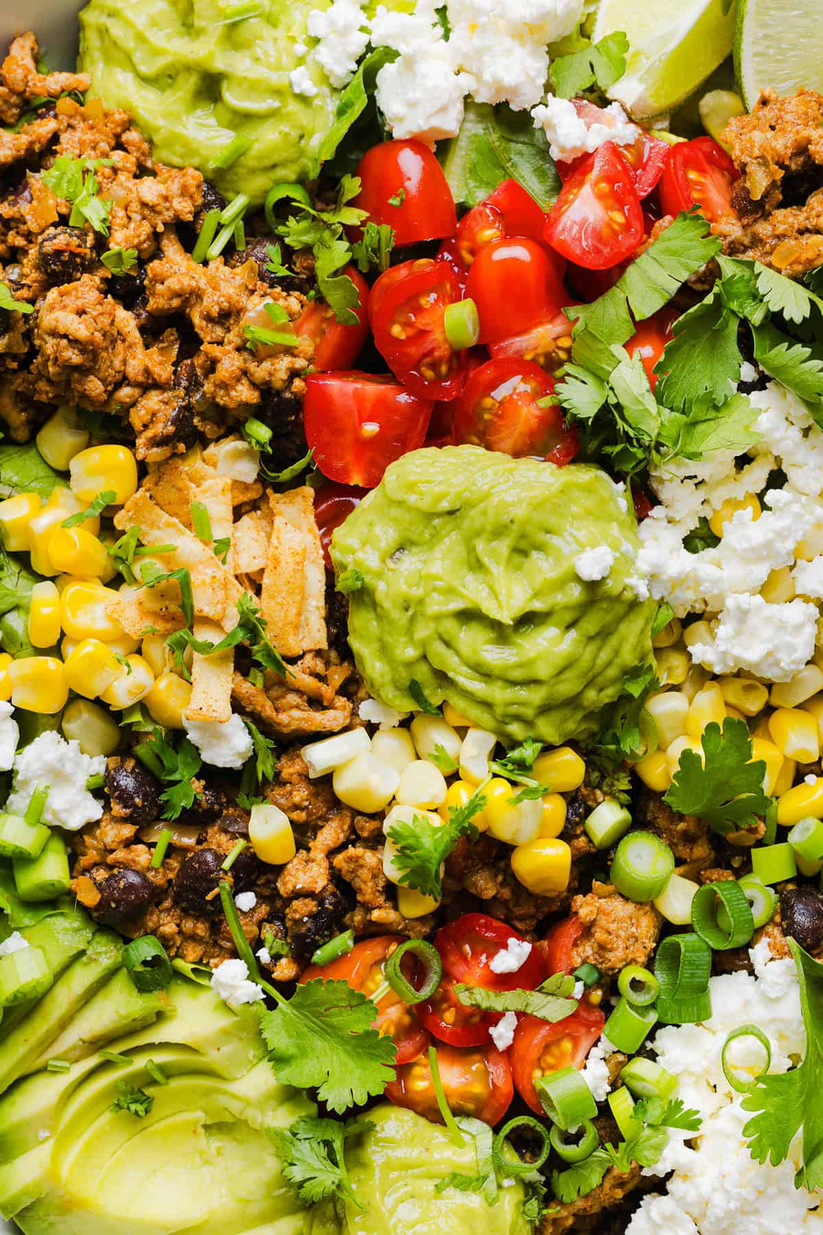 This quick and easy Healthy Taco Salad is packed with seasoned ground turkey, fresh veggies and all your favorite toppings to pack in the flavor! Perfect for busy weeknights, meal prep or even serving a crowd!