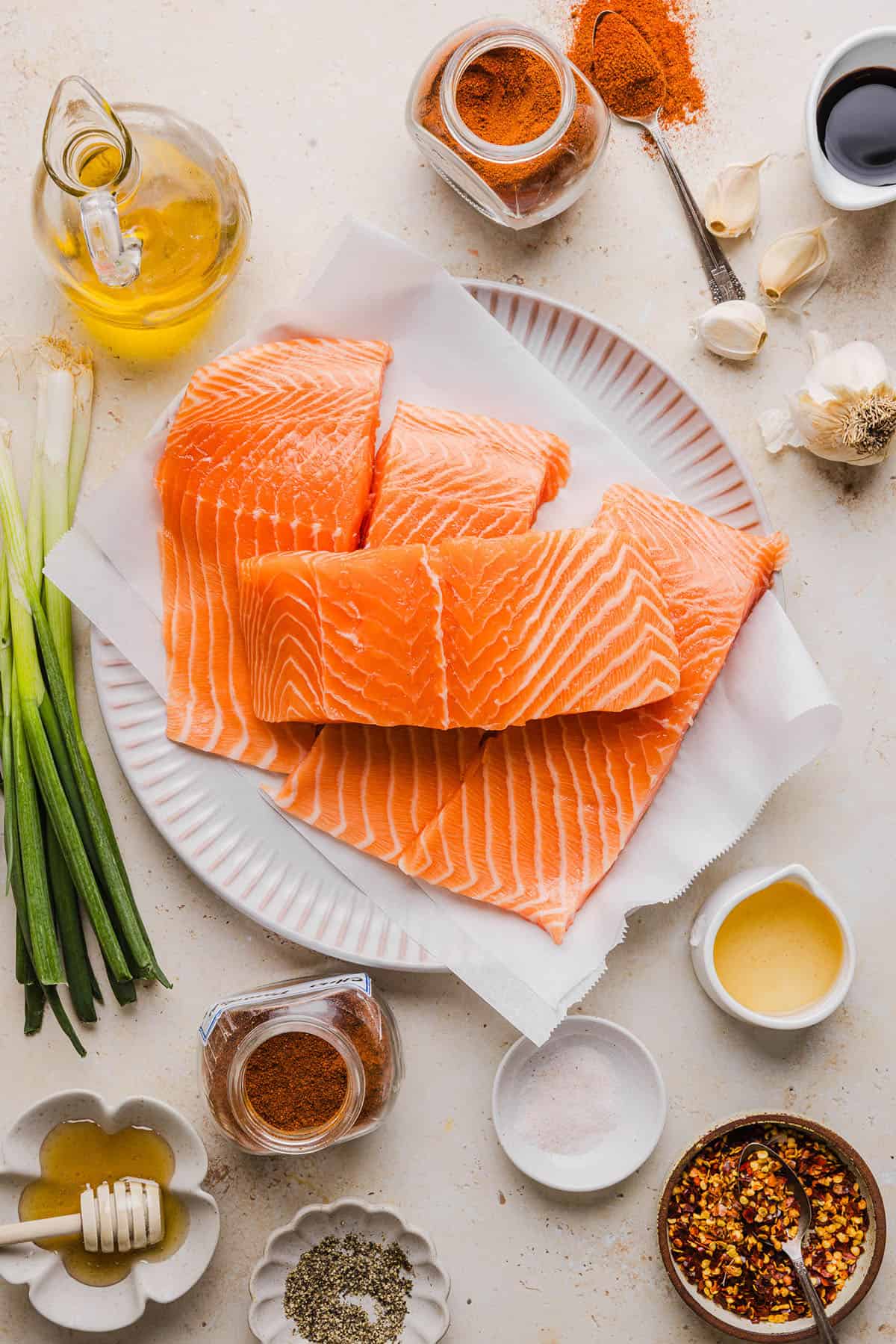 The most flavorful Hot Honey Glazed Salmon that is tender, flaky and coated in a sweet and savory homemade hot honey sauce. This simple healthy recipe easily comes together in under 20 minutes!