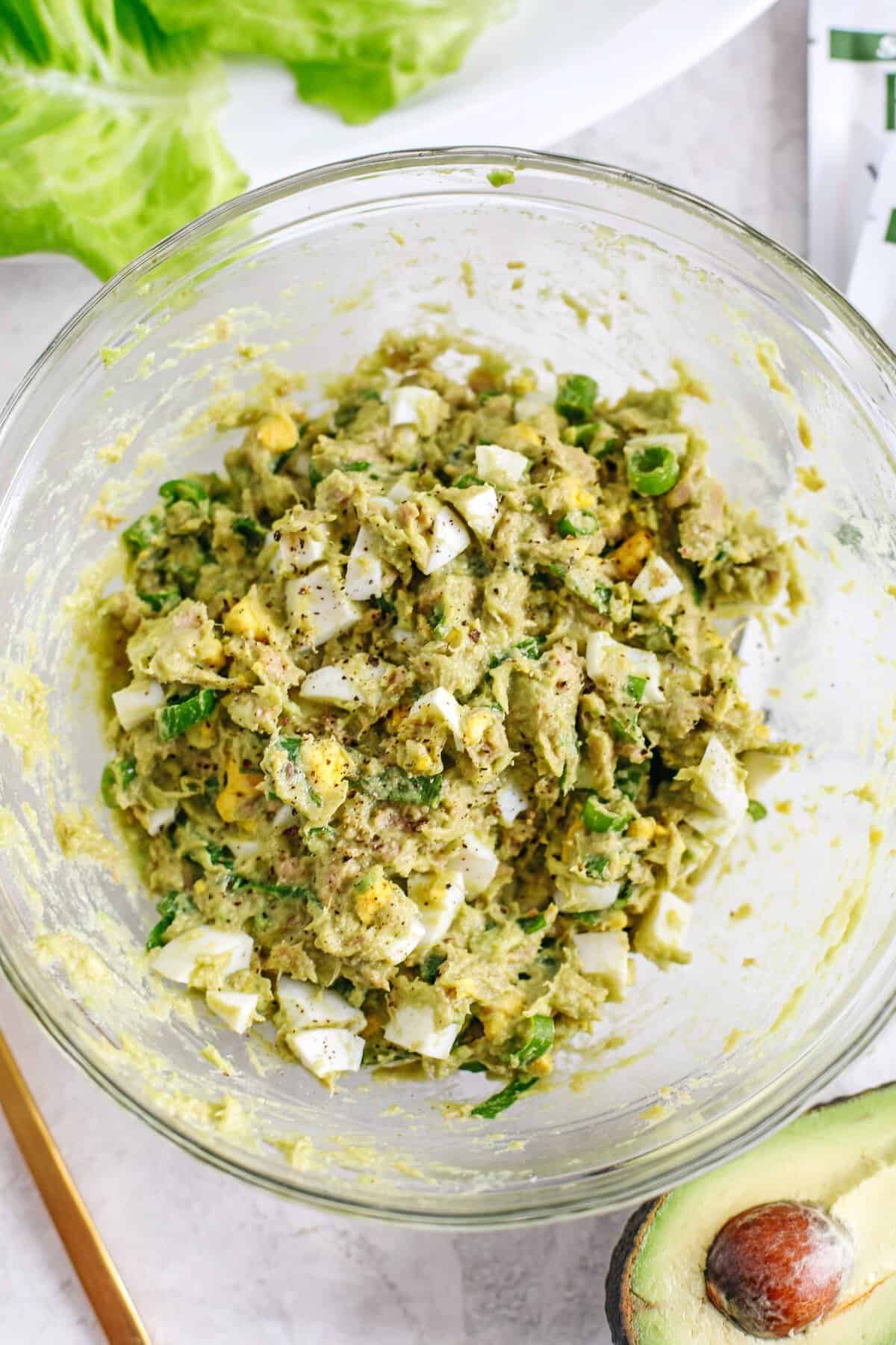 This Tuna Avocado Egg Salad is a fresh, hearty mix of tender tuna, creamy avocado, and chopped hard-boiled eggs, all tossed with simple, wholesome ingredients. Such an easy way to use up leftover eggs while creating a filling, nutrient-dense meal that's perfect for quick lunches, lettuce wraps or meal prep.