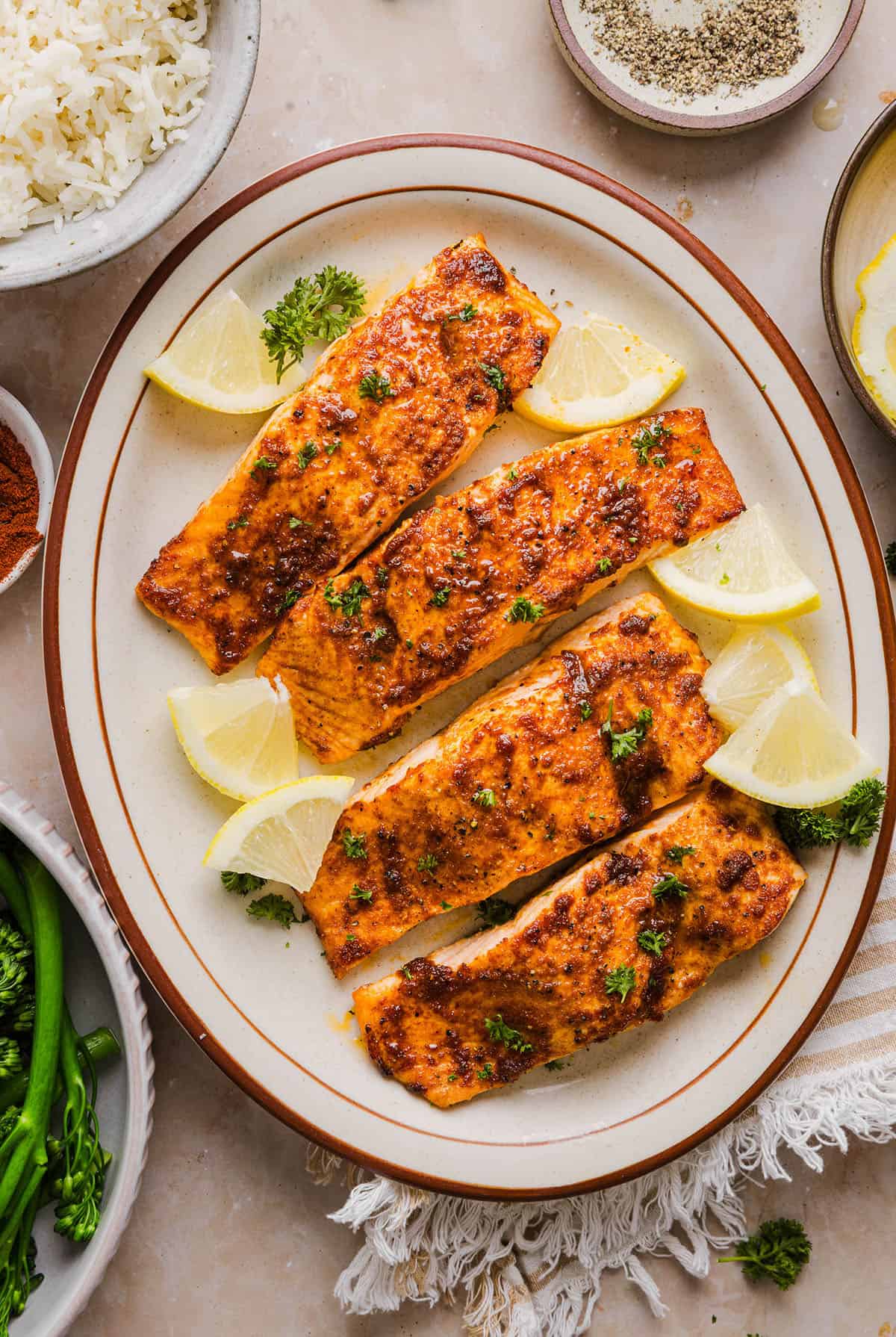 Easy Air Fryer Salmon that turns out perfectly flaky every time in under 10 minutes! Seasoned with a blend of spices for a delicious, healthy meal great for busy weeknights or when you need to meal prep.