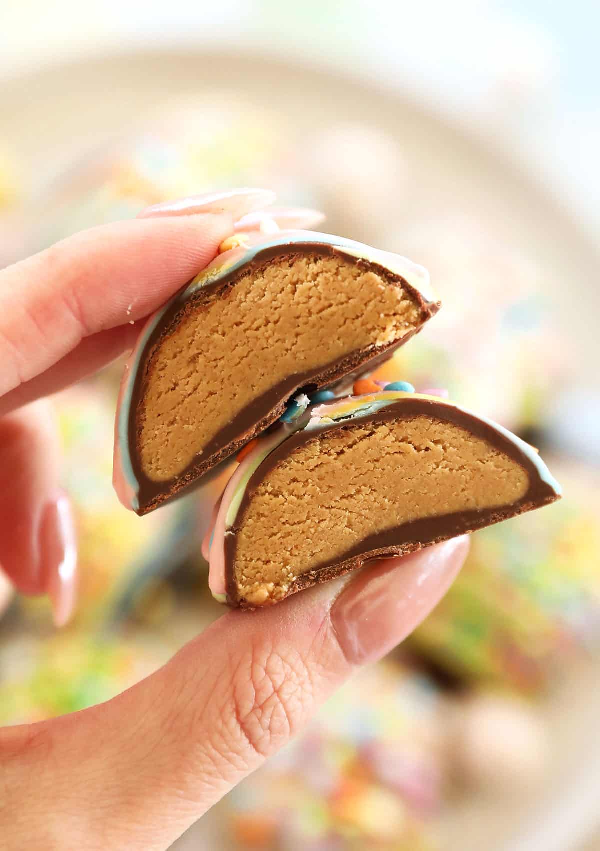These Healthy Chocolate Peanut Butter Eggs are an easy no-bake Easter treat made with just a few simple ingredients! A healthier version of Reese's eggs that are gluten-free and refined sugar-free!